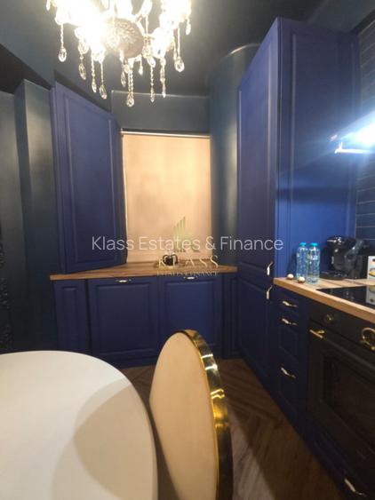 Apartament cu 2 camere - Bd. Dacia -P-ta  Romana - 10