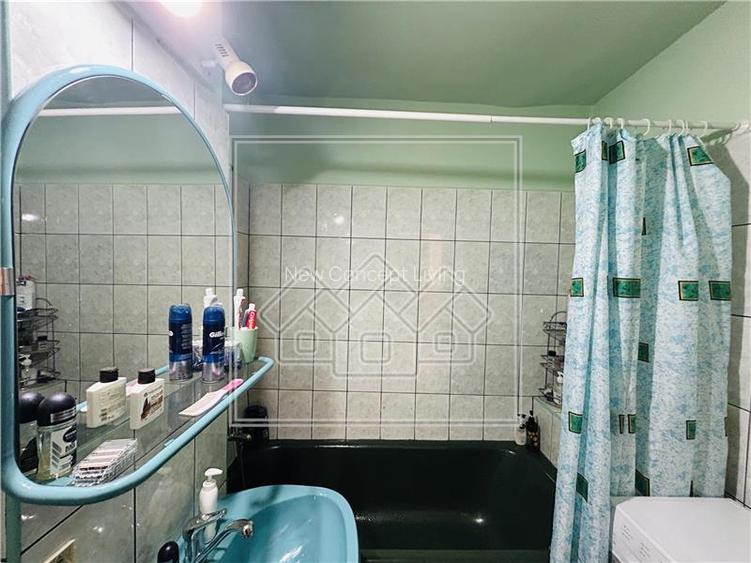 Apartament de vanzare in Sibiu - 3 camere, 2 balcoane + pivnita - - 14