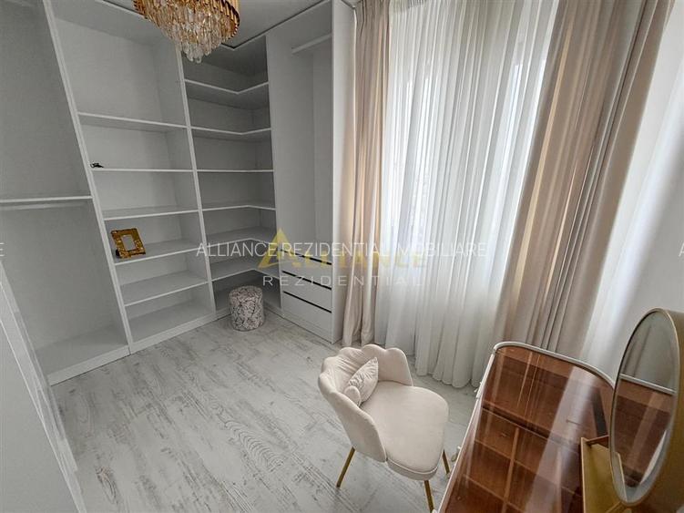 Vila individuală P+1E - 4 camere - 2 băi - teren 400mp - mobilată - 7