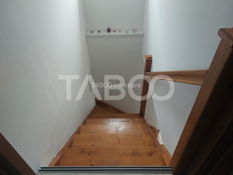 Casa in zona centrala 5 camere 2 bucatarii 3 bai curte comuna Cisnadie - 25