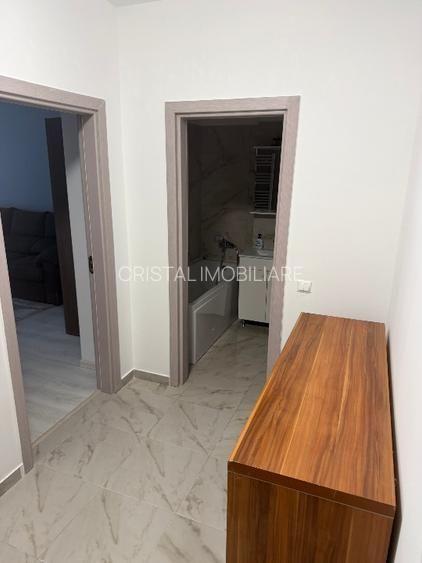 Garsoniera decomandata, centrala proprie, parcare inclusa, etaj 1 - 10