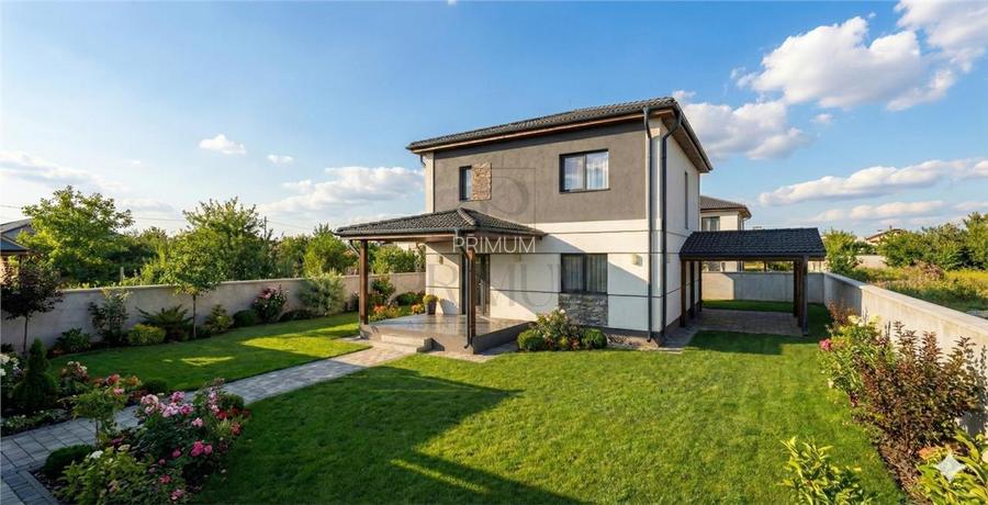 Casa individuala - carport - 2 fronturi stradale - 5 camere - 4