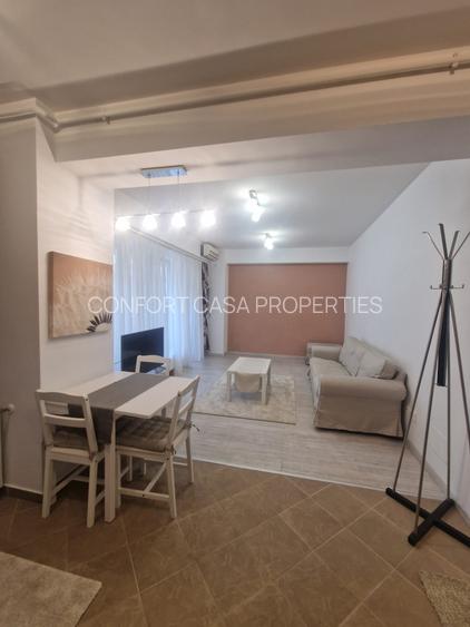 ASE -  Romana - Dorobanti - nou - 2 camere - mobilat modern - centrala termica - 2