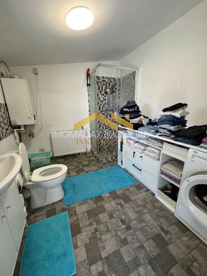 -Casa Individuală -3 dormitoare -2 băi - - 11