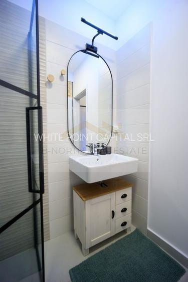 Garsonieră de închiriat, bloc 2022, etaj 10, parcare subterană inclusă - 12