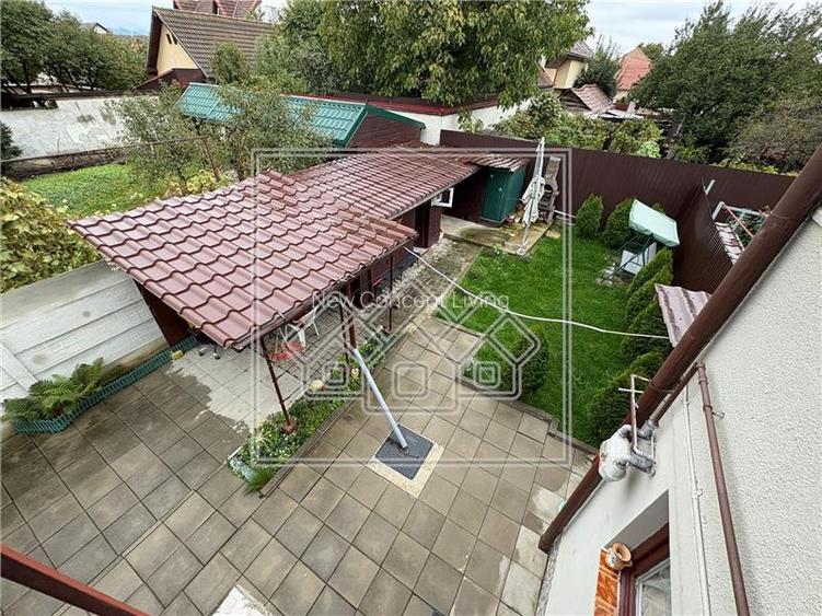 Casa de vanzare in Sibiu -  4 camere, balcon si curte - mobilata - 10