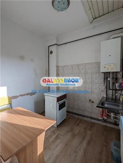 Timpuri Noi ,Suprafata Utila  175mp , doua garsoniere si un apartament - 6