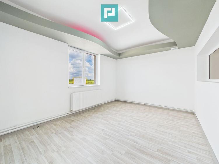 Clădire P+E cu parcare si platformă betonată 700mp