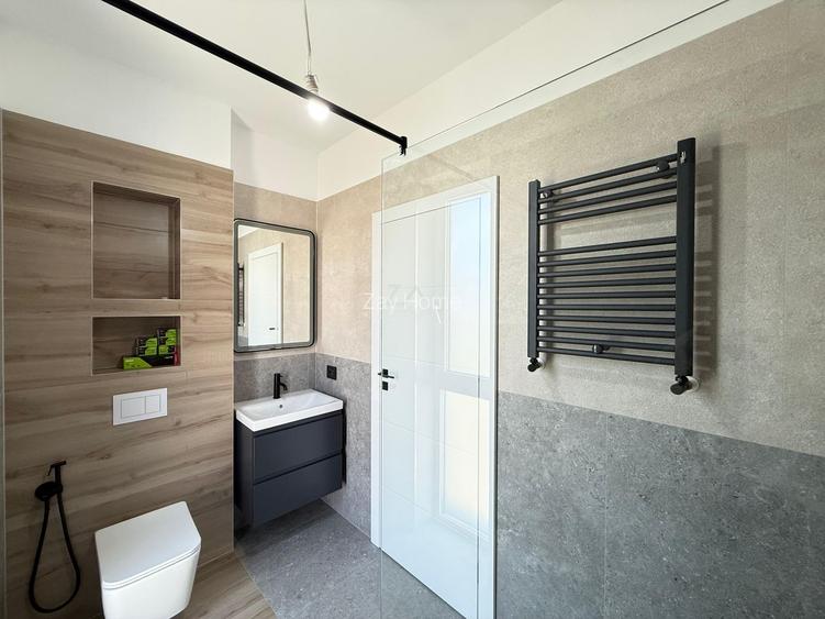 Ap pe 2 niveluri. 3 camere, 2 bai. 2 locuri de parcare. - 4