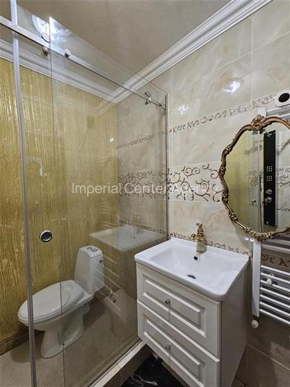 APARTAMENT CU 2 CAMERE DE VANZARE IN ZONA DE SUS,PARTER IN ONESTI - 7
