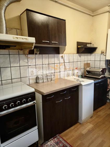 Apartament 2 camere bloc caramida etaj 1 - 2