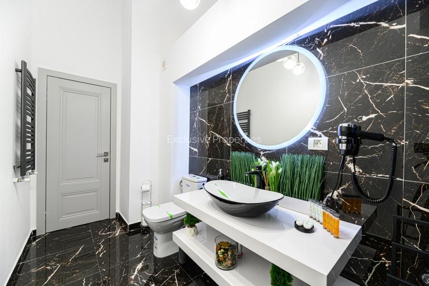 Apartament unic in PREDEAL – LUX, vedere la partie cu terasa si parcare - 16