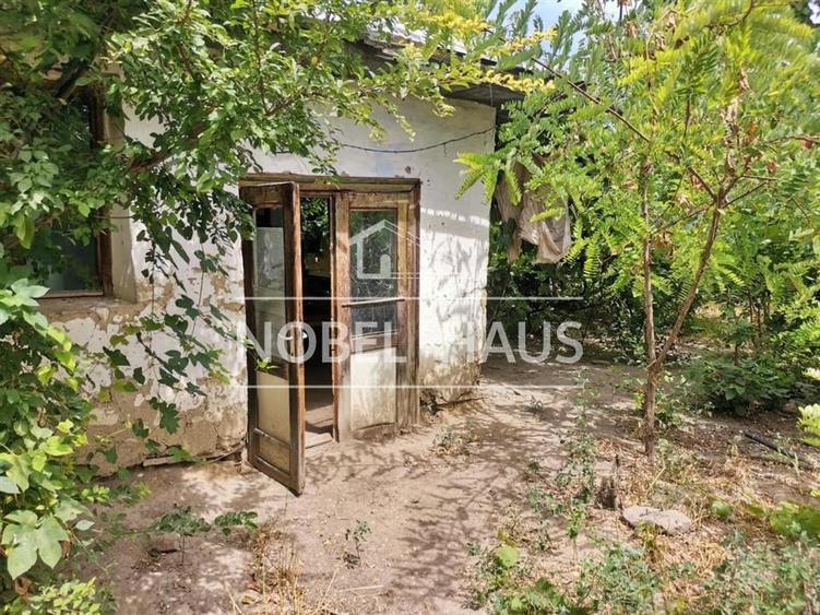 Teren 1070 mp si casa demolabila, in Barlad, zona Gara, str. Minerva