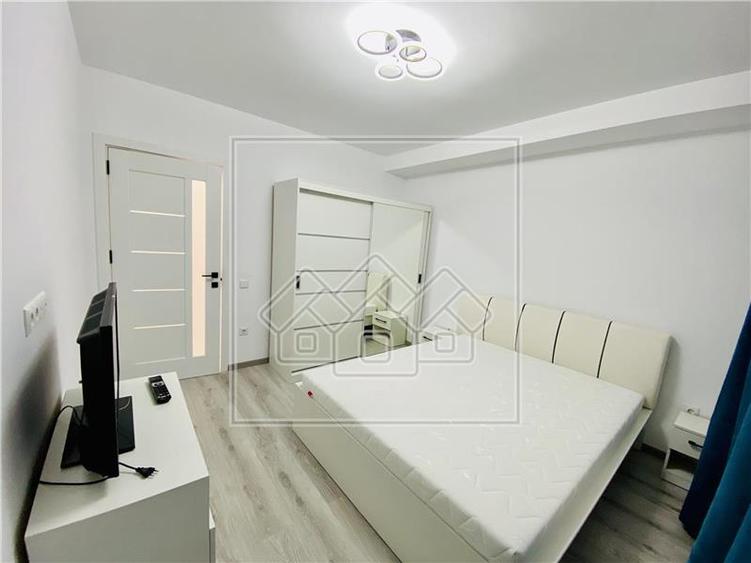 Ap. 2 camere si gradina, mobilat si utilat modern, zona D. Stanca