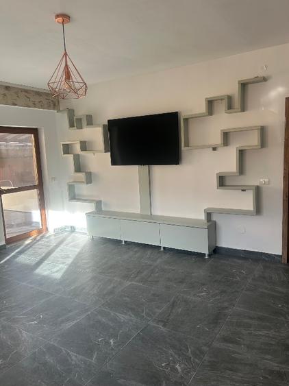 Apartament spatios 75mp plus terasa 75 mp plus boxa in demisol 25 mp