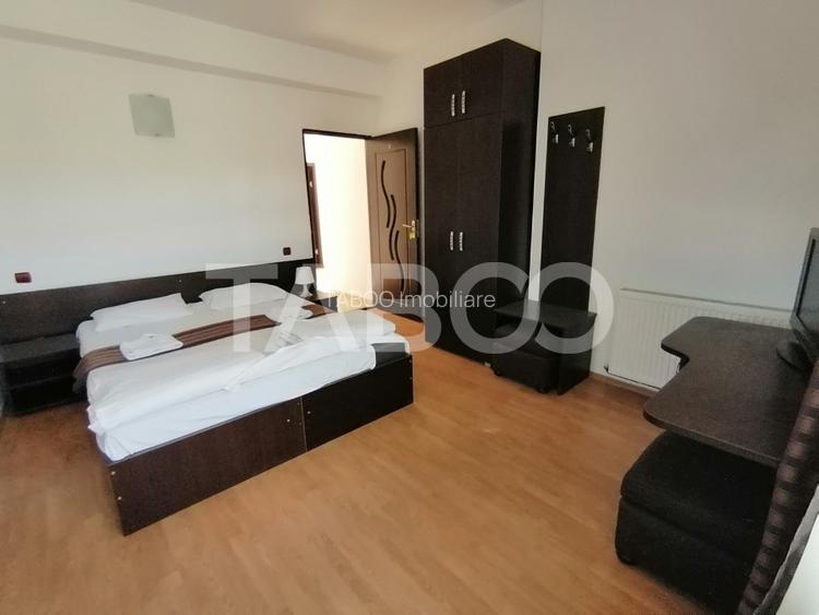 Pensiune 13 camere 16 bai sauna piscina si teren 1565 mp Cisnadioara - 34