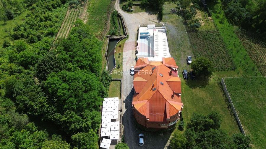 DE VANZARE Pensiune cu piscina, pastravarie, zona spa locatie de vis - 7