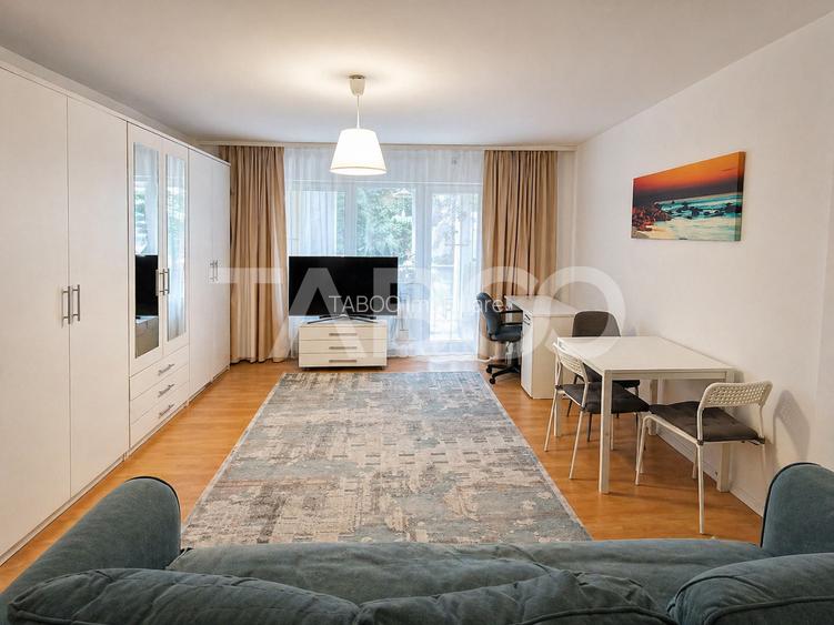Garsoniera de vanzare 47 mp utili cu o mica gradina de 17 mp - 4