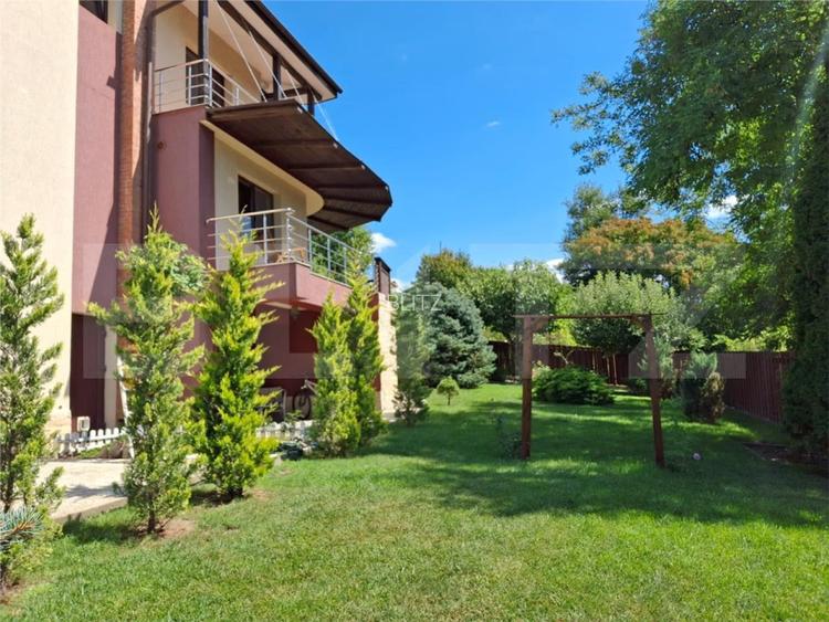 Proprietate eleganta cu teren mare si garaj in Bucium, perfecta pentru familie - 10