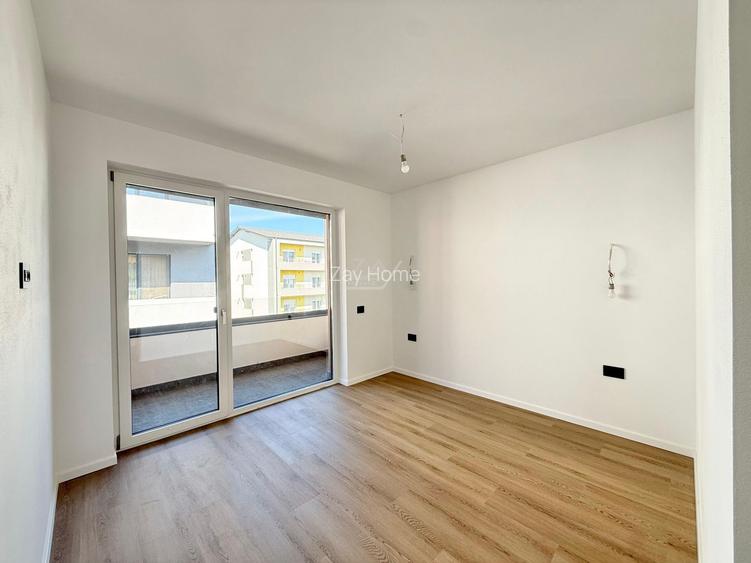 Ap pe 2 niveluri. 4 camere, 2 bai. 2 locuri de parcare. - 5