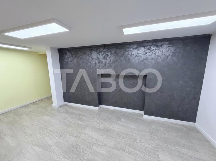 Cladire de birouri cu spatiu comercial la parter si 6 locuri parcare