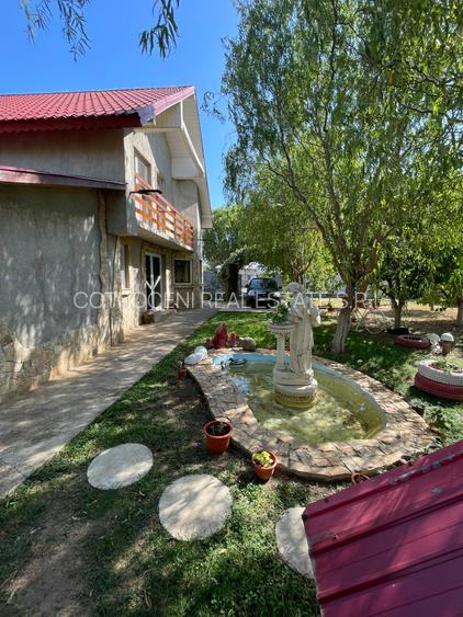 Refugiul Tău Verde: Casă Spațioasă cu Livadă, Anexe și Panouri Solare - 9