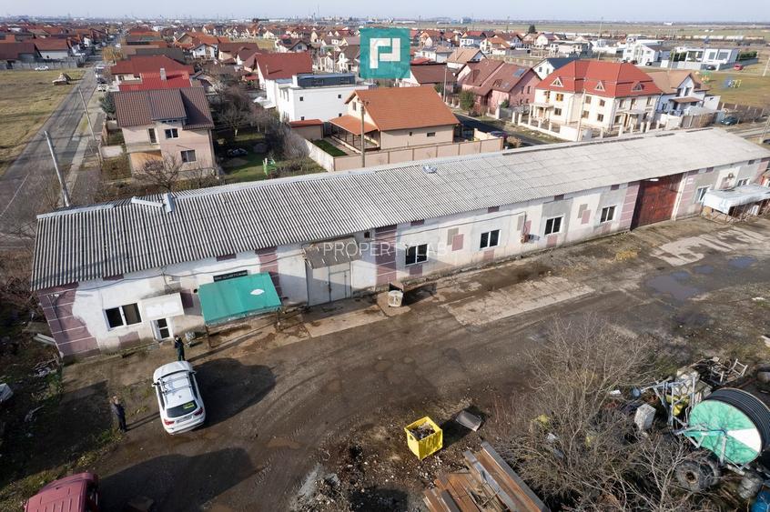 Teren intravilan 6.555 mp cu hală industrială - 6