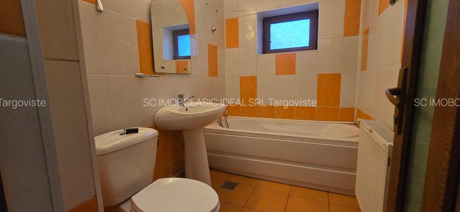 Targoviste, str. Boerescu Zaharia, parter, vanzare apartament 4 camere - 10