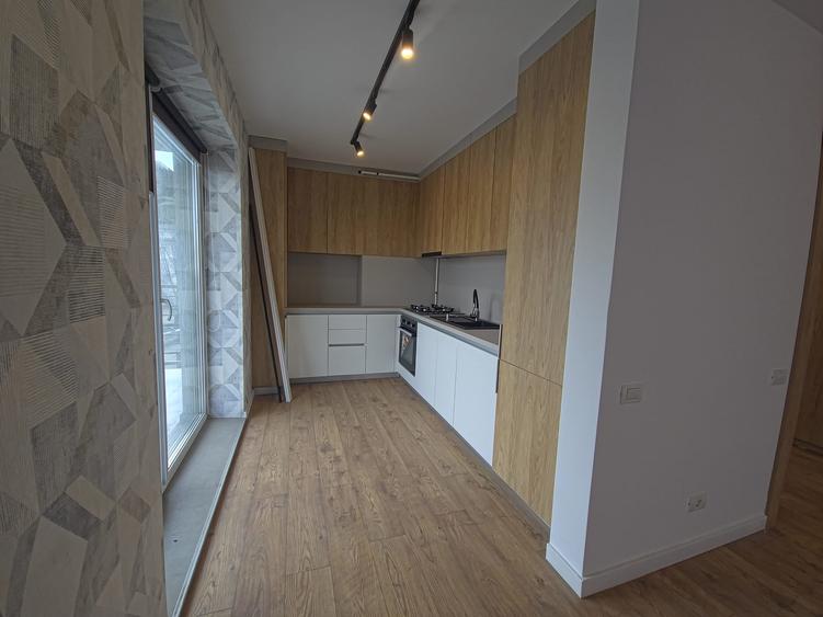 Dacia apartament 2 camere nou cu lift loc parcare subteran in pret