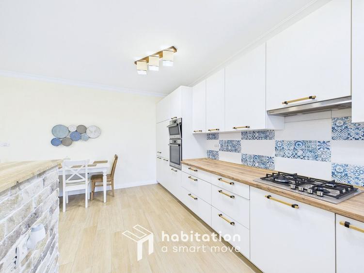 Apartament spațios cu curte și garaj – confortul unei case moderne