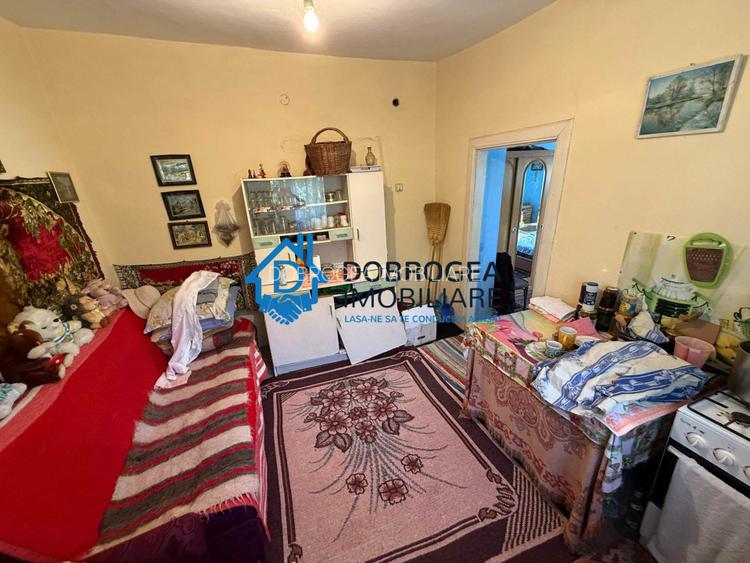 Caslita - teren 513 mp, pomi fructiferi, casa 2 camere - 6