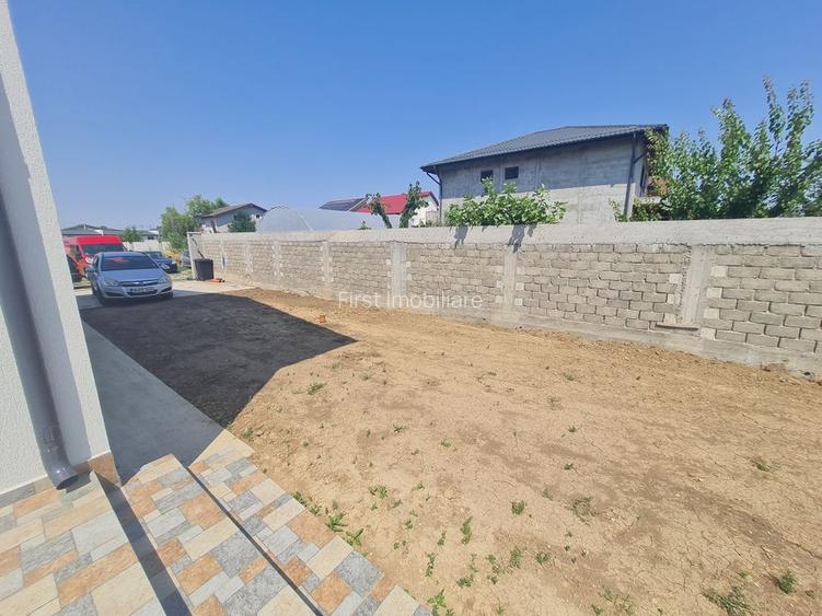 Vila cu 4 camere,2 bai,finisaje deosebite,curte 330 mp - 12