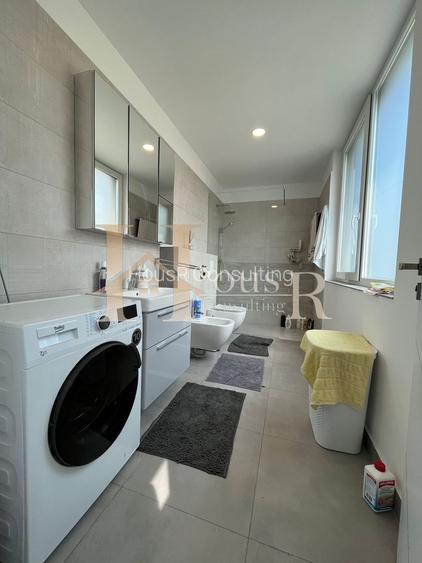 Apartament in vila, dispunere pe 3 niveluri. Gradina proprie. Terasa de 31 mp. - 9