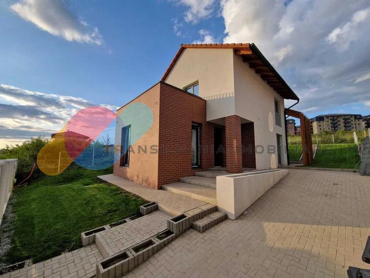 Casa de vanzare 128mp + 514mp teren - Chinteni