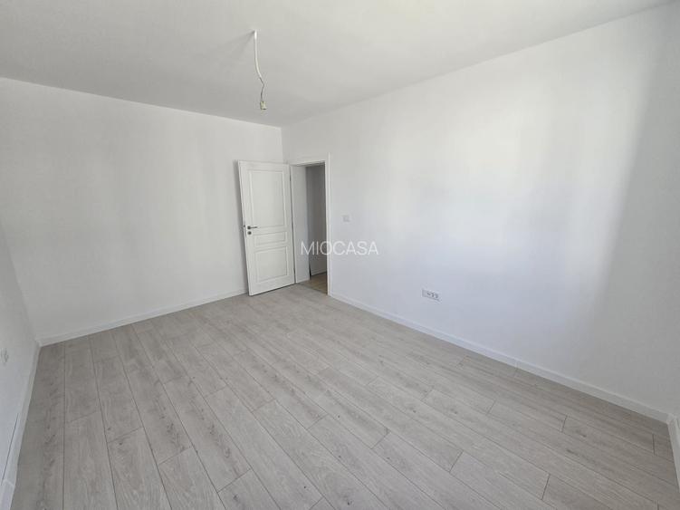 Model spatios - 55 mp. Decomandat. Bucatarie inchisa. - 9