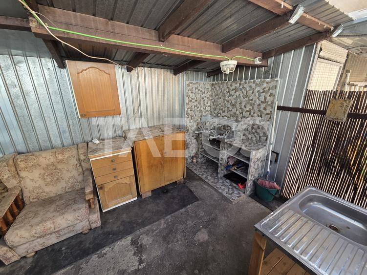 Casa 2 camere curte comuna de vanzare zona Centrala 47 mp utili