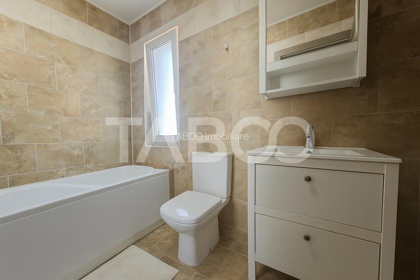 Casa de vanzare in Zavoi cu 3 camere 2 bai curte libera de 50 mp - 14