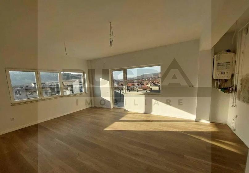 Apartament finisat cu 3 camere, 75 mp, parare, zona Baciu Regal