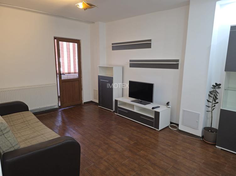 Garsoniera moderna transformata in doua camere in Gavana / Lumina - 4