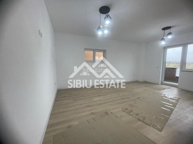 Apartament cu 2 camere, balcon+logie, s.utila 59,75 mp.-  loc de parcare - 9