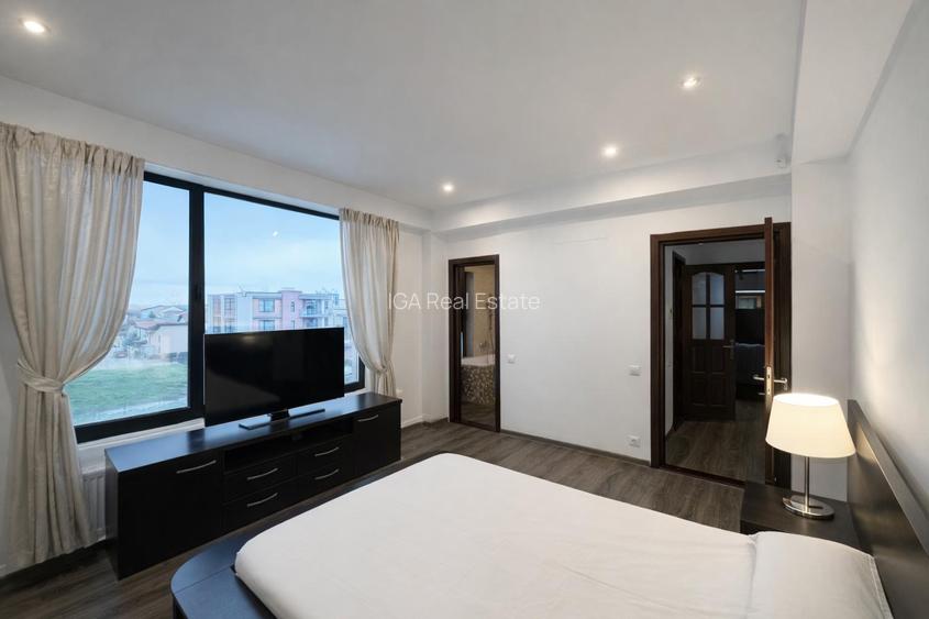 Un apartament ca o casa cu terasa generoasa si doua locuri de parcare - 8