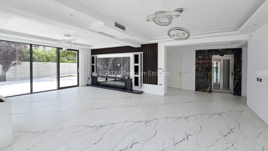 Casa superba cu teren 1000 mp, lift, 2 dormitoare parter, spatii generoase - 15