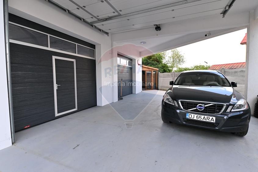 Proprietate premium în Filiași, locuință de lux cu spații comerciale - 40