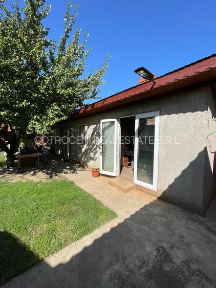 Refugiul Tău Verde: Casă Spațioasă cu Livadă, Anexe și Panouri Solare - 6