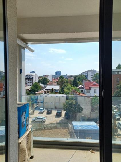 Garsoniera+loc de parcare de inchriat in zona Victoriei – Titulescu!
