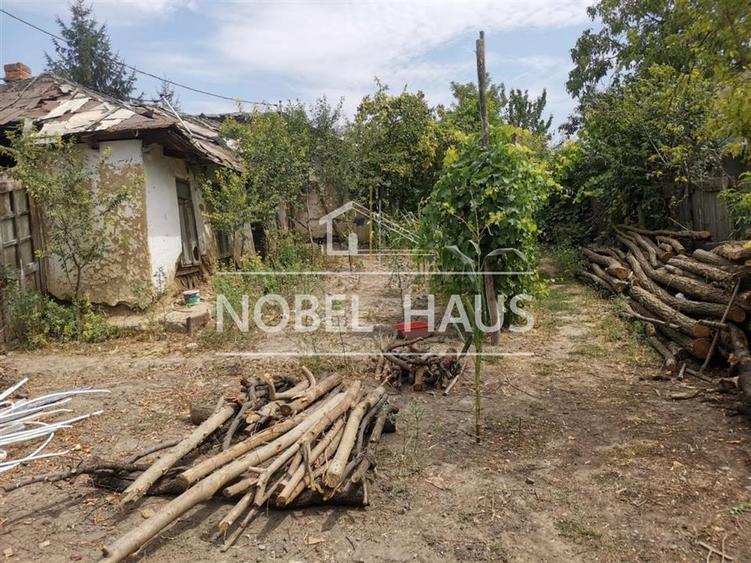 Teren 1070 mp si casa demolabila, in Barlad, zona Gara, str. Minerva