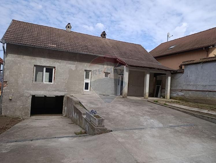 Investiție rară lângă Sighișoara – de vanzare casa lângă pădure și E60