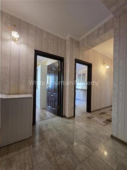 Apartament central cu acces la gradina si 2 locuri parcare - 31