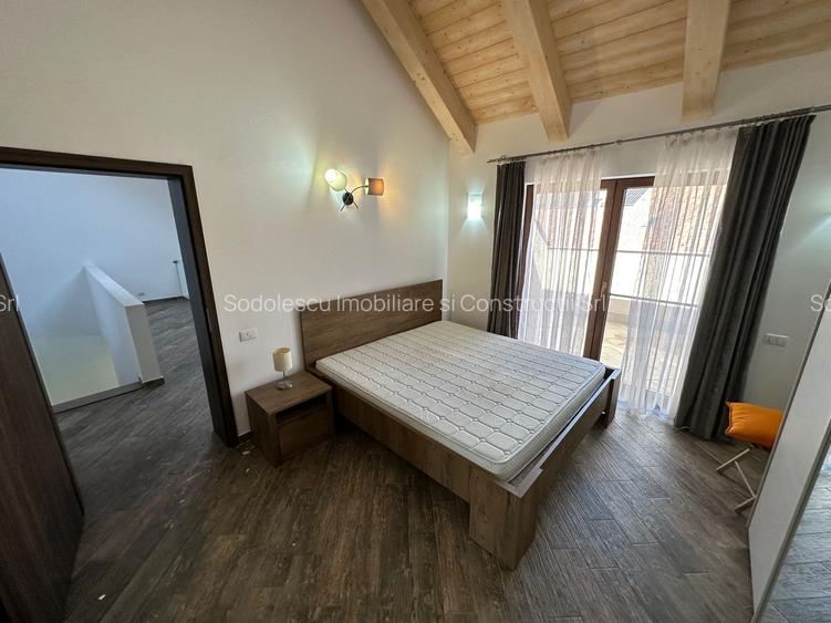 CASA SPATIOASA  CU GARAJ SI TEREN DE 600 MP - 13