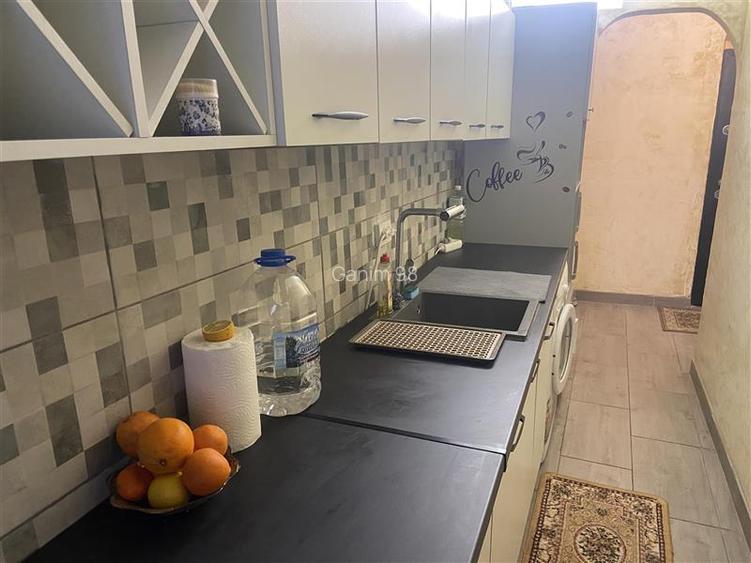 Garsoniera de vanzare , zona ultracentrala Primaria Focsani , decomandata , imbu - 3